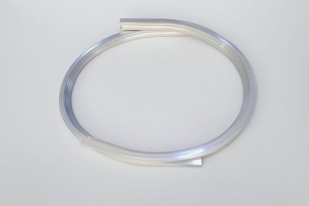 Perfiles semicirculares de aluminio para ensamble de ventanas elípticas compuestas