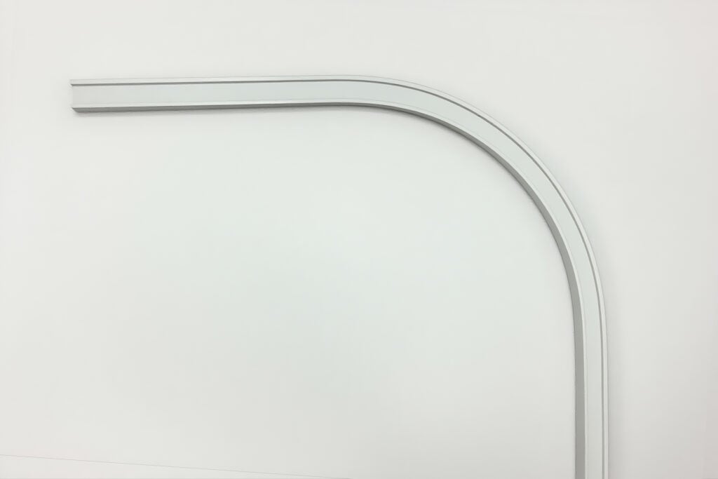 Perfil de aluminio curvado en ángulo para transición de líneas LED